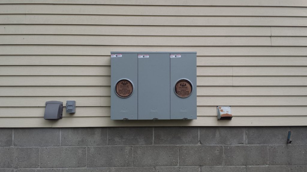 Rough in installation of a duplex electrical meter housing.